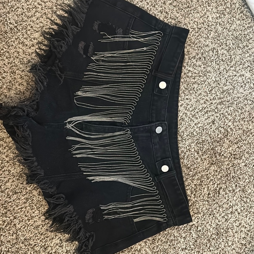 Black jean shorts with silver chains